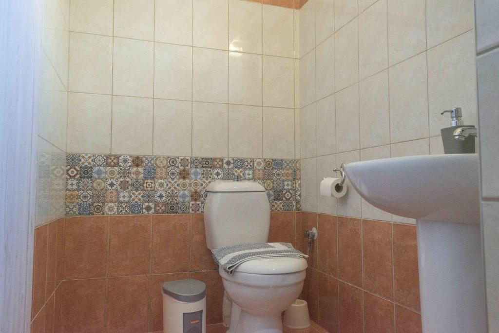 Koupelna v ubytování Pasithea apts