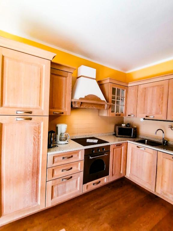 A kitchen or kitchenette at Appartement Bel Monte - Kärnten Card Sommer inklusive