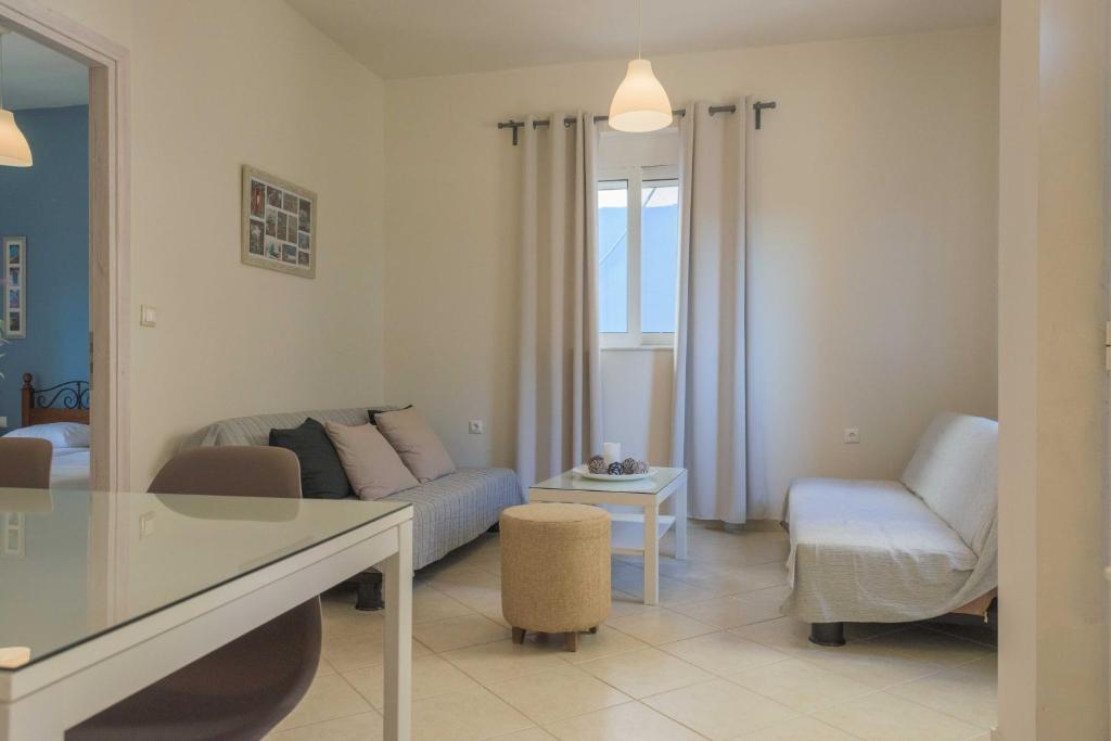 Postel nebo postele na pokoji v ubytování Pasithea apts