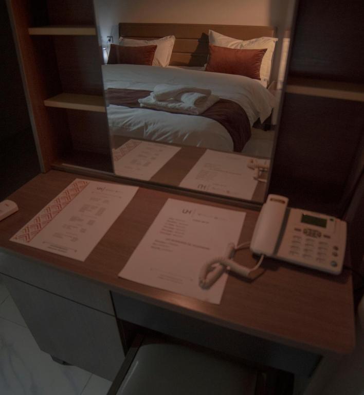 Postel nebo postele na pokoji v ubytování Urban Hotel Nouakchott