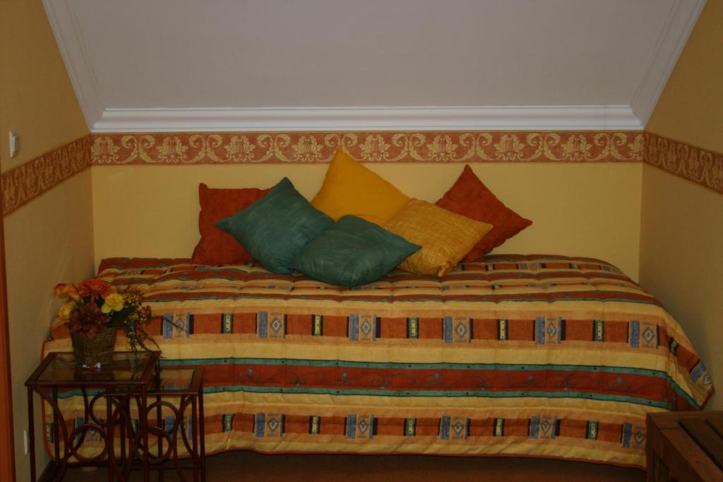 Postel nebo postele na pokoji v ubytování Hotel Le Relais de Pommard