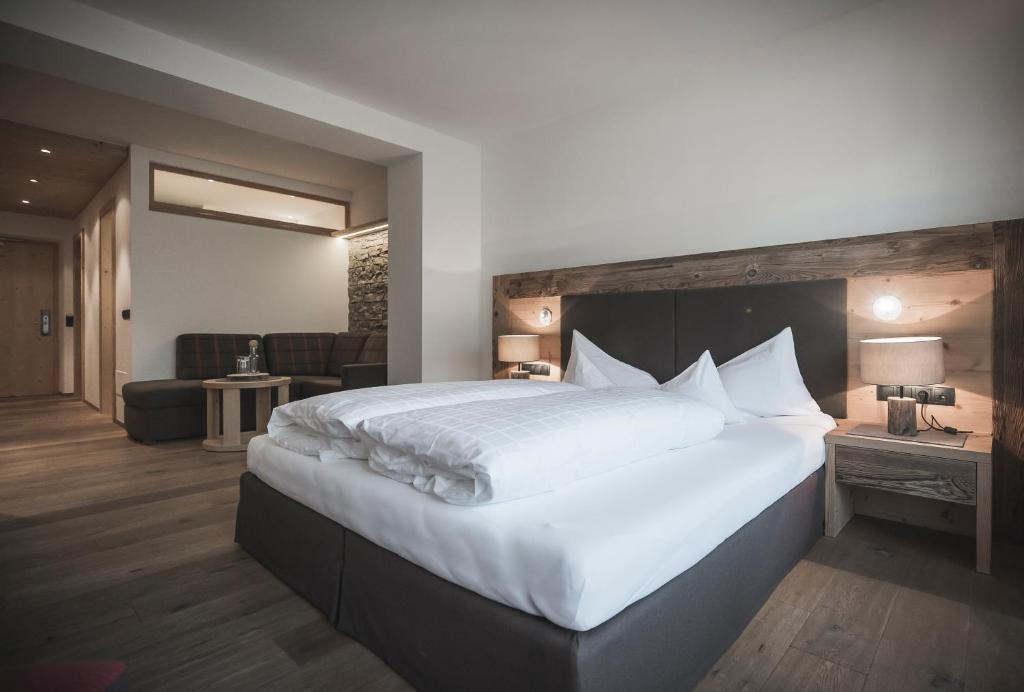 Postel nebo postele na pokoji v ubytování Hotel Alpenblick