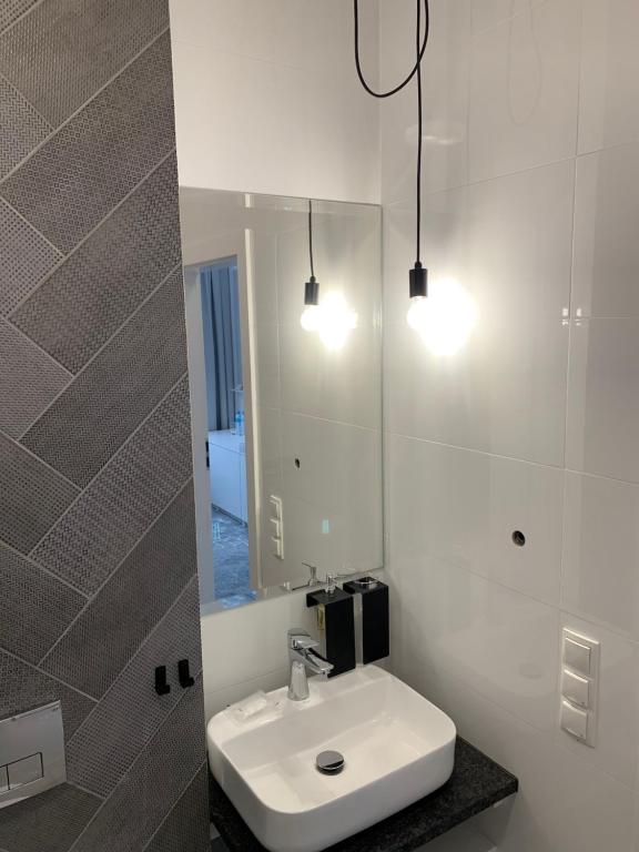 Koupelna v ubytování Hotel Coliber