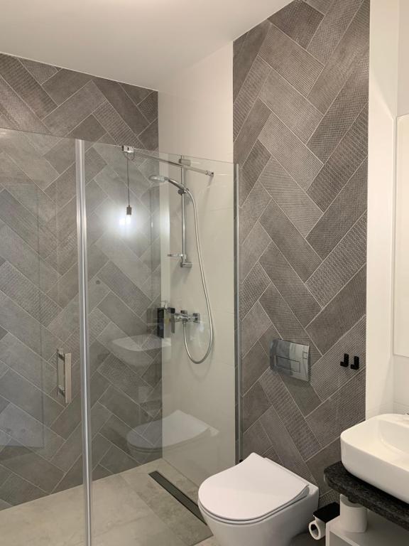 Koupelna v ubytování Hotel Coliber