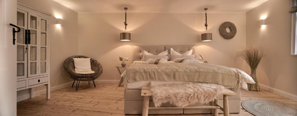 Postel nebo postele na pokoji v ubytování Loft 1540 - Boutique Ferienwohnungen