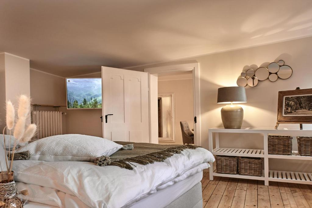 Postel nebo postele na pokoji v ubytování Loft 1540 - Boutique Ferienwohnungen