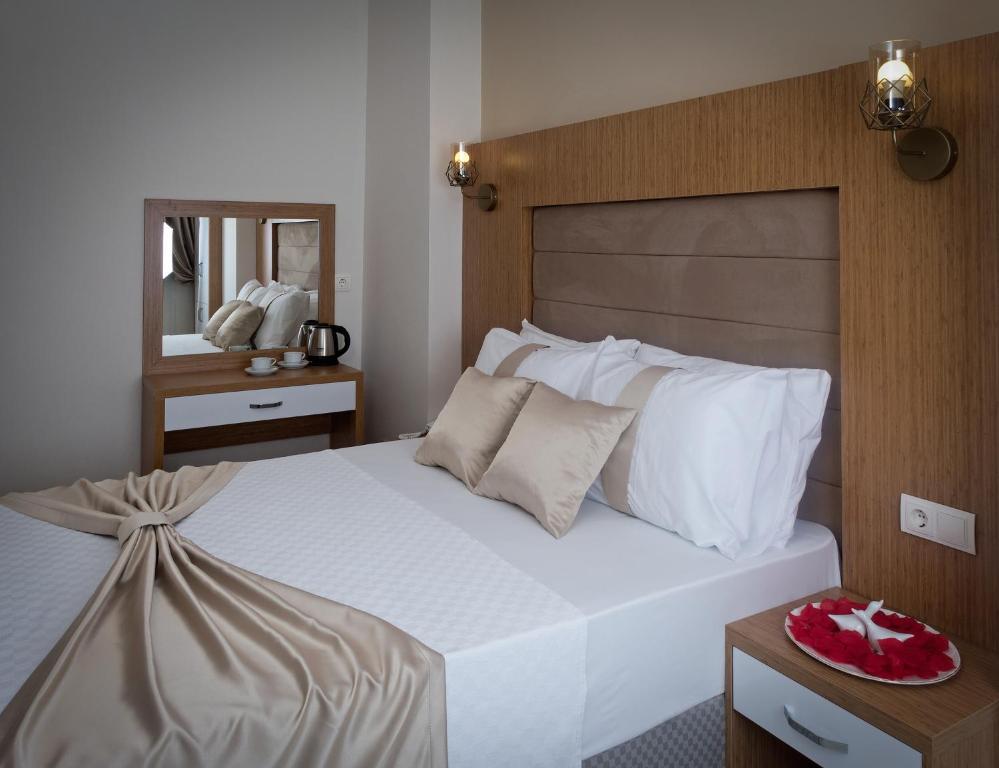 Postel nebo postele na pokoji v ubytování Zeyn Otel Istanbul