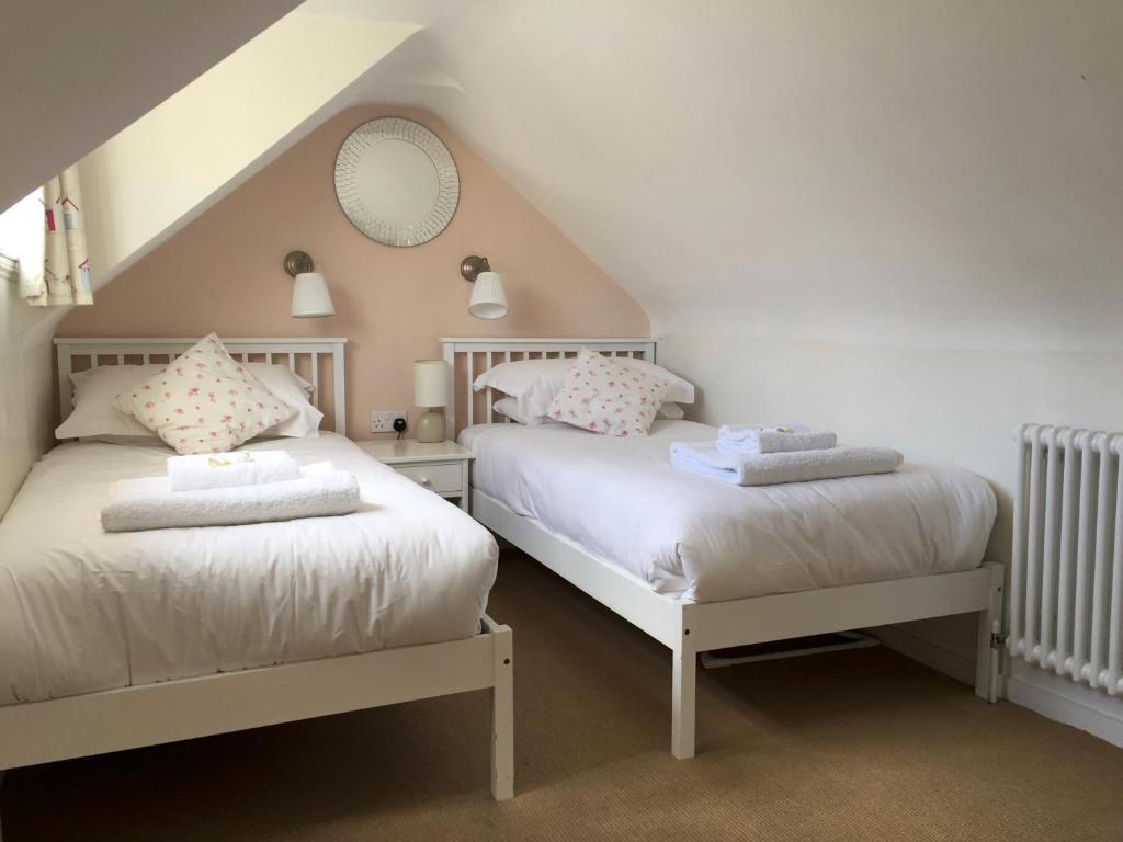 Un ou plusieurs lits dans un hébergement de l'établissement Oriel Cottage, Aldeburgh