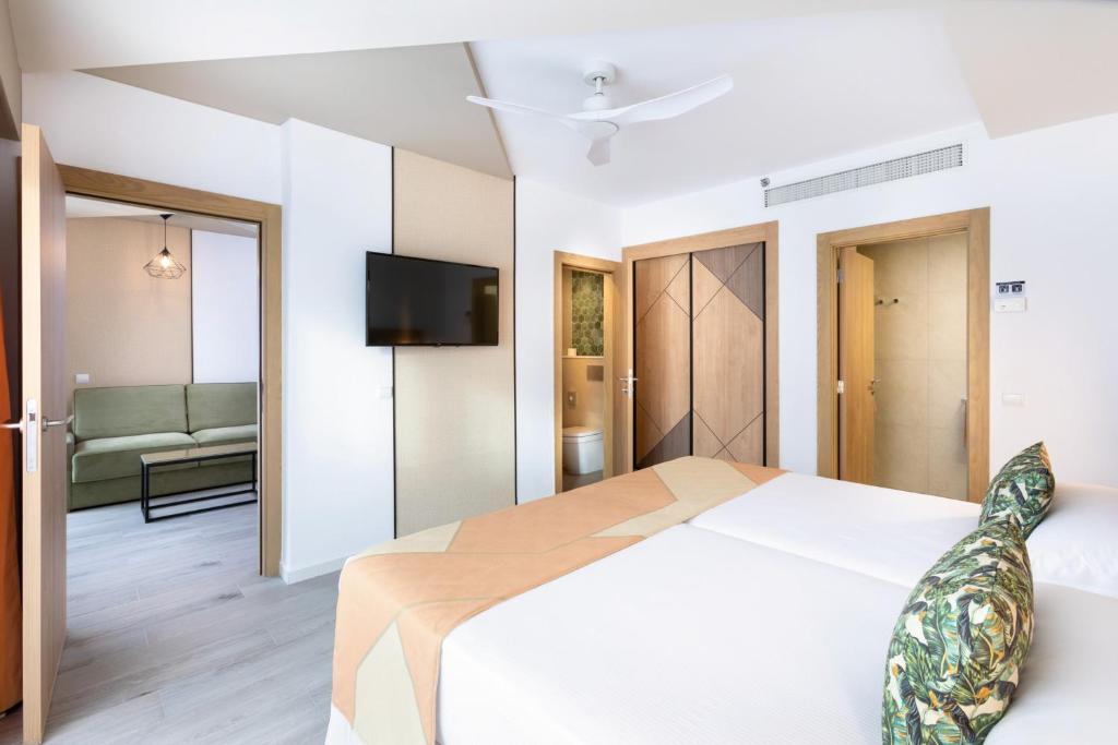 Postel nebo postele na pokoji v ubytování Hotel Riu Buenavista - All Inclusive