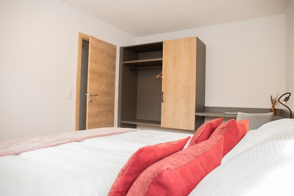 Postel nebo postele na pokoji v ubytování Das Moos