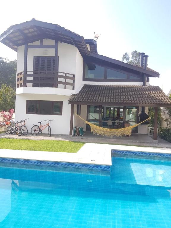  linda casa em bertioga cond hanga roa