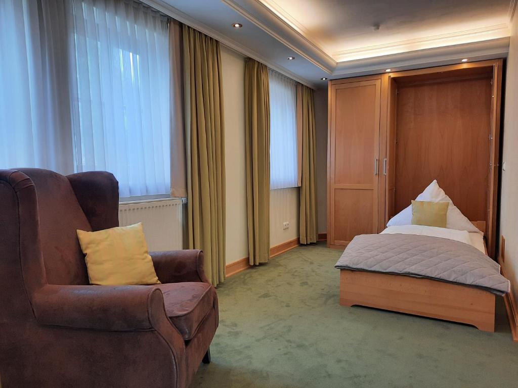 Postel nebo postele na pokoji v ubytování Hotel Vier Spitzen