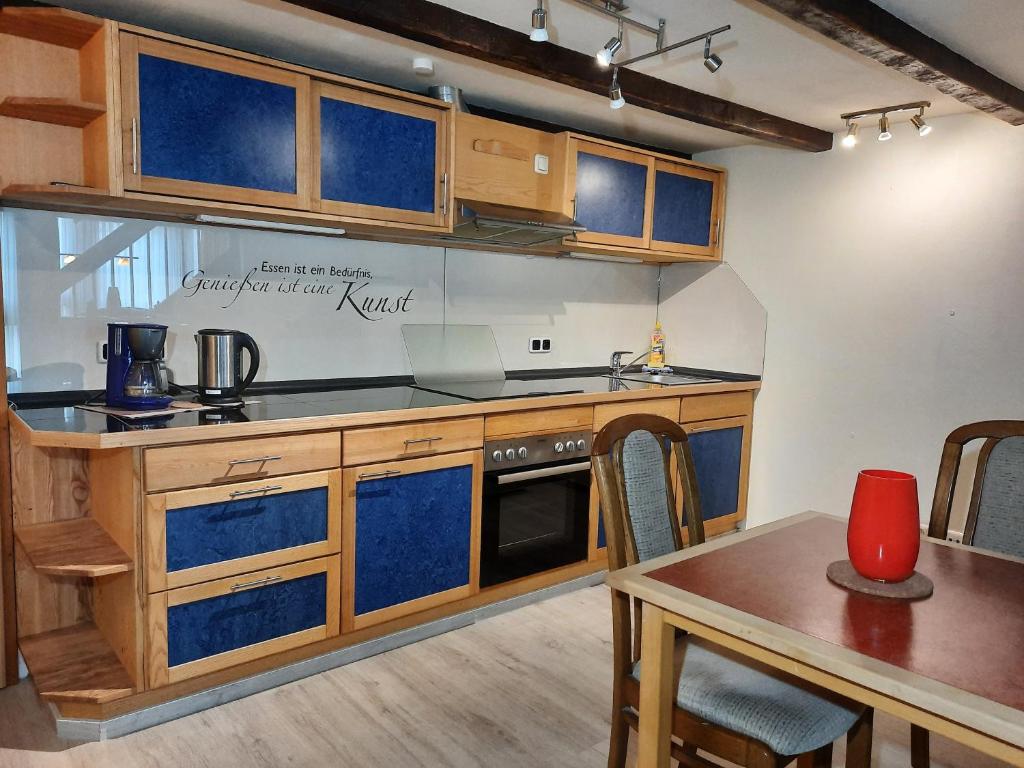 Kuchyň nebo kuchyňský kout v ubytování Hotel Vier Spitzen