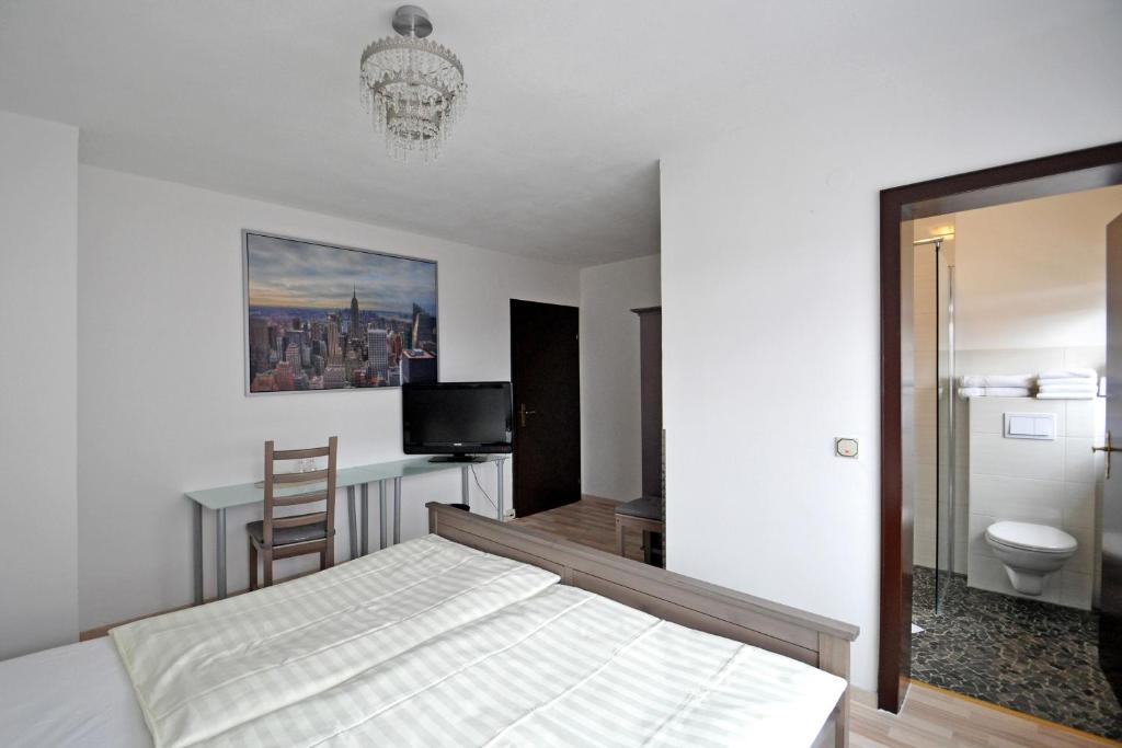 Postel nebo postele na pokoji v ubytování Hotel Reuter