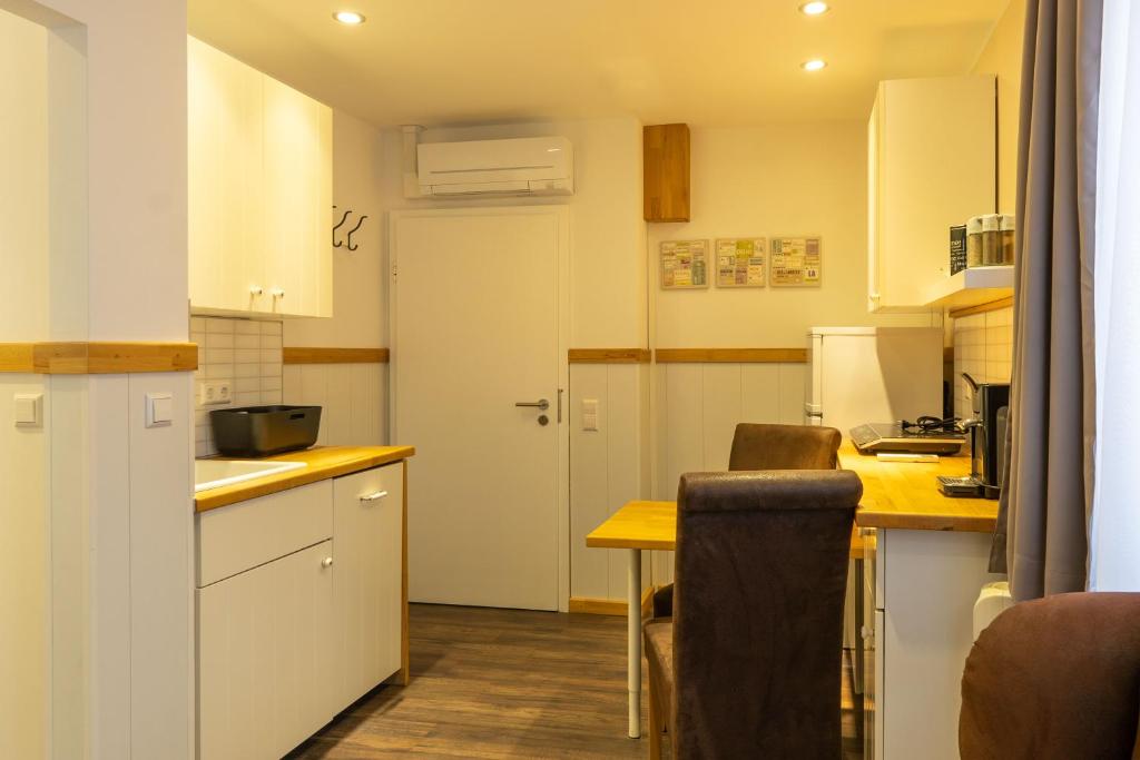 Kuchyň nebo kuchyňský kout v ubytování Hotel Post mit Klimaanlage