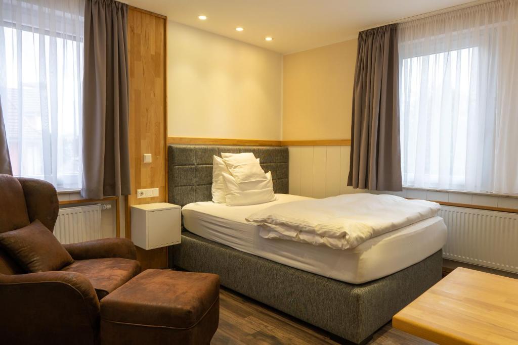 Postel nebo postele na pokoji v ubytování Hotel Post mit Klimaanlage