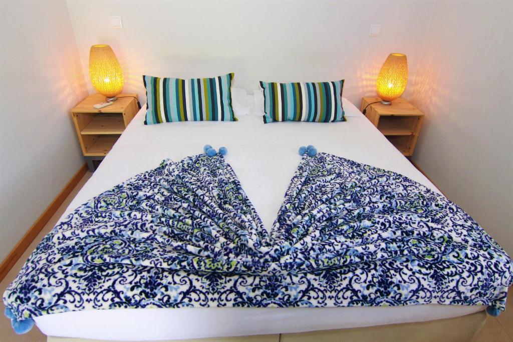 Uma cama ou camas num quarto em Aldeia do Tâmega
