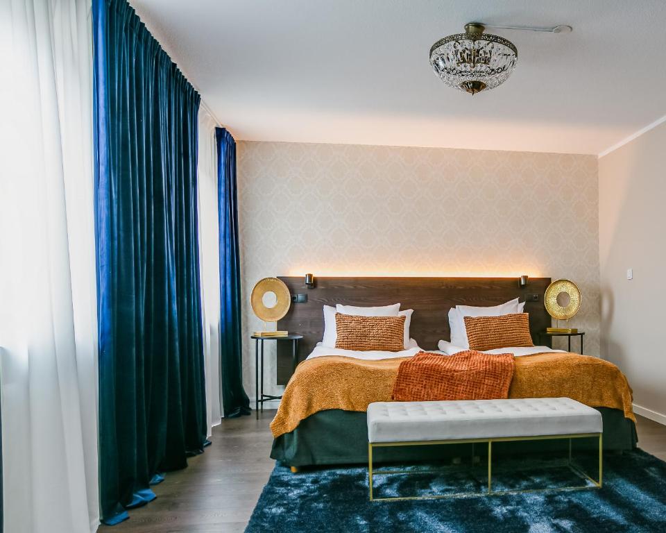 Postel nebo postele na pokoji v ubytování Best Western Hotel Savoy