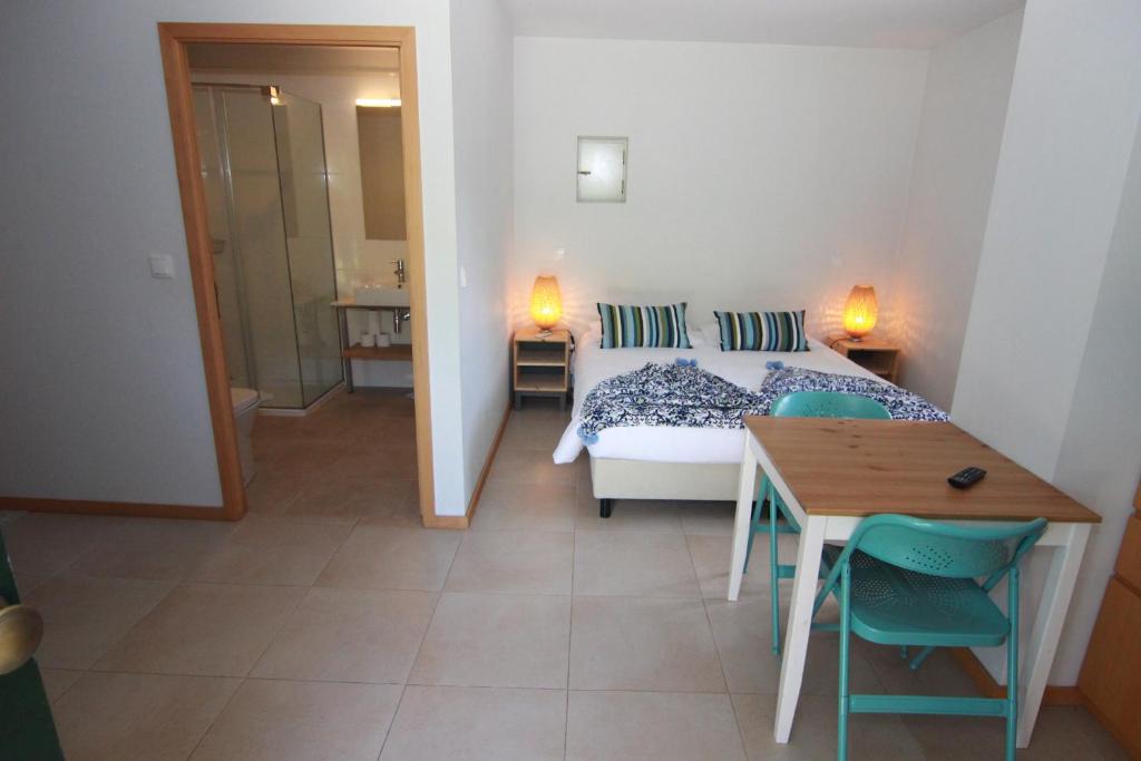 Uma cama ou camas num quarto em Aldeia do Tâmega