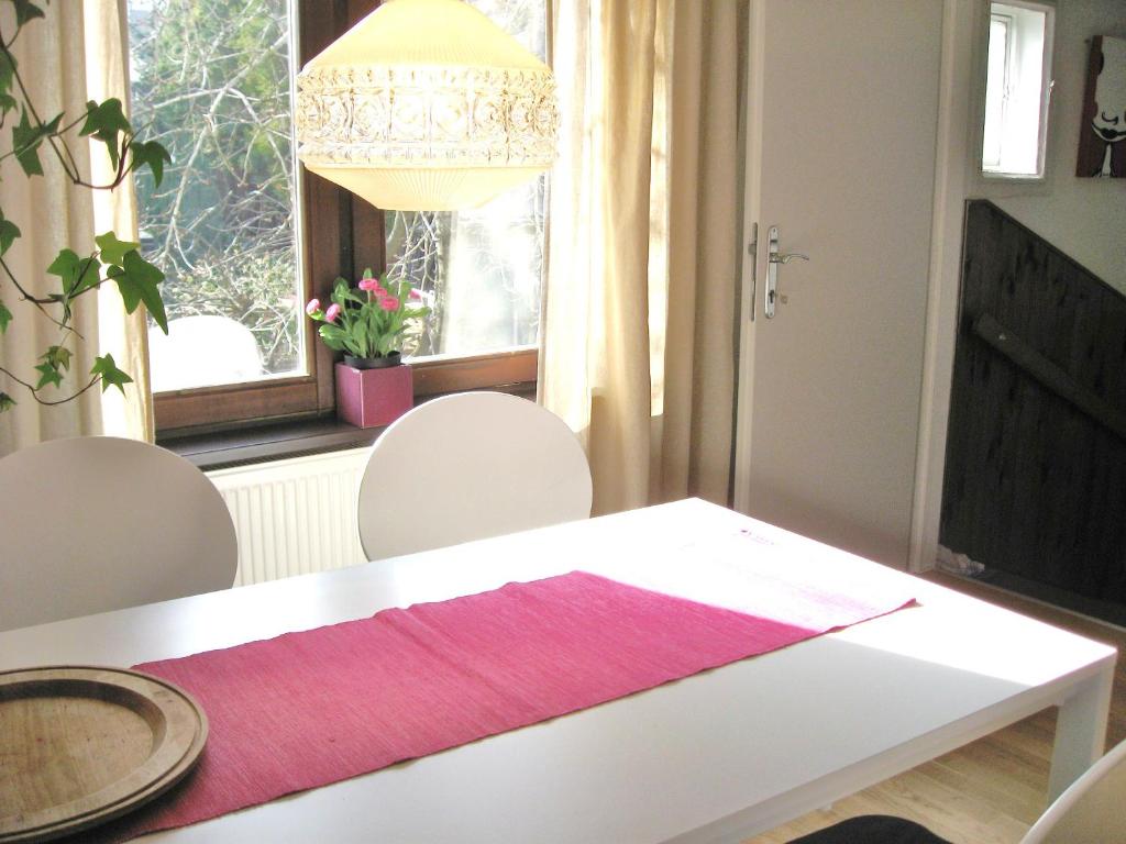 Televízia a/alebo spoločenská miestnosť v ubytovaní Hanna Apartment