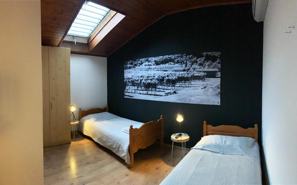 Katil atau katil-katil dalam bilik di Borgovecchio Albergo