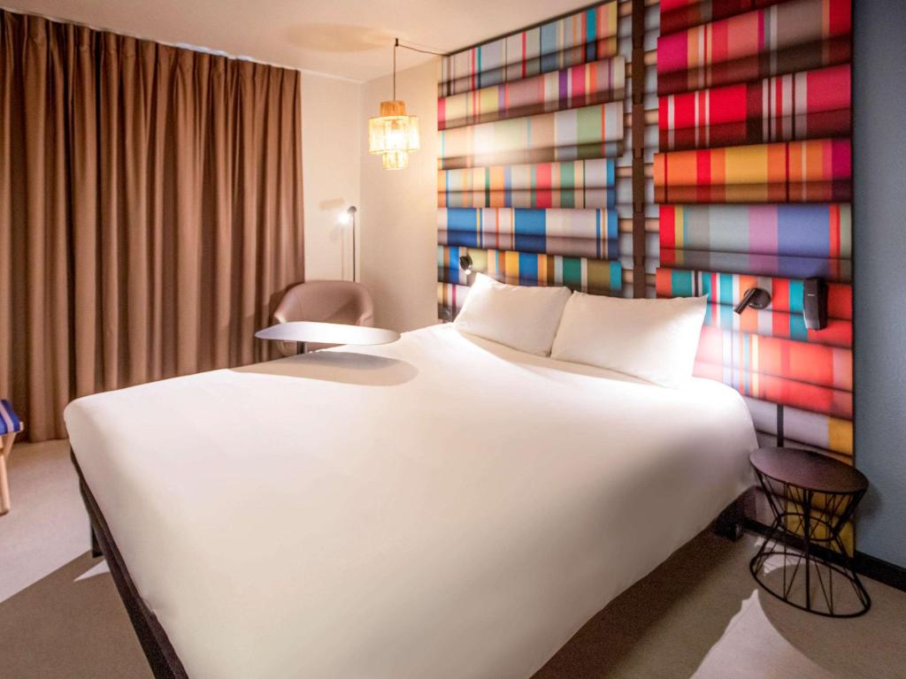 Postel nebo postele na pokoji v ubytování ibis Styles Perpignan Centre Gare