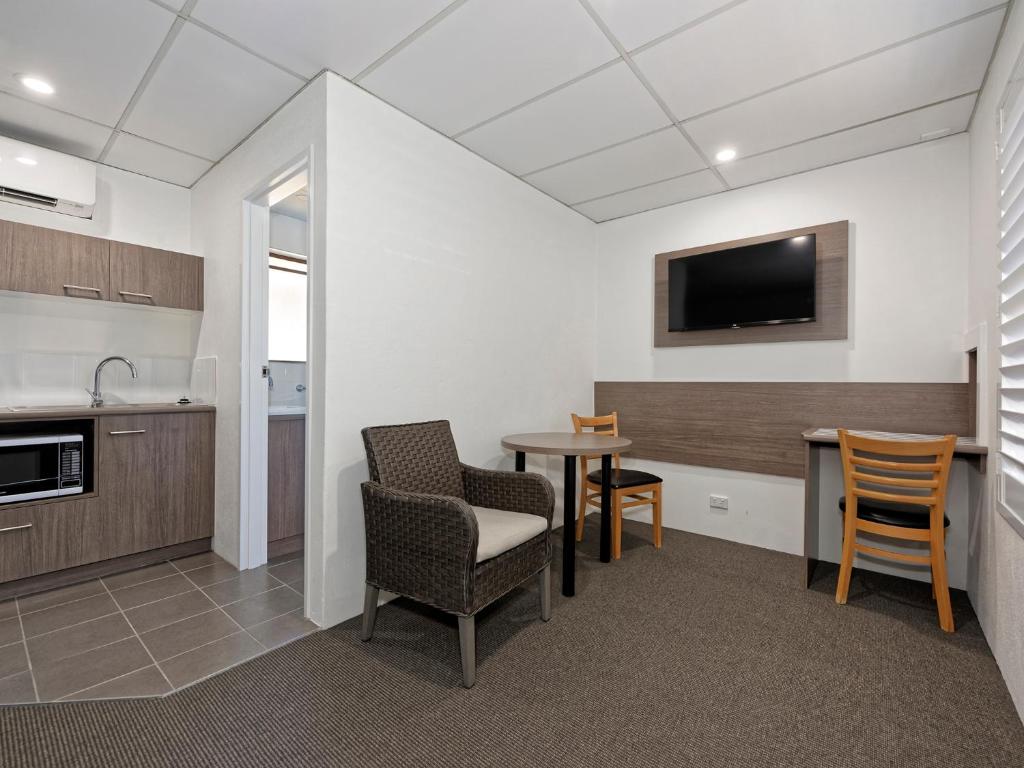 Kuchyň nebo kuchyňský kout v ubytování Chalet Motor Inn