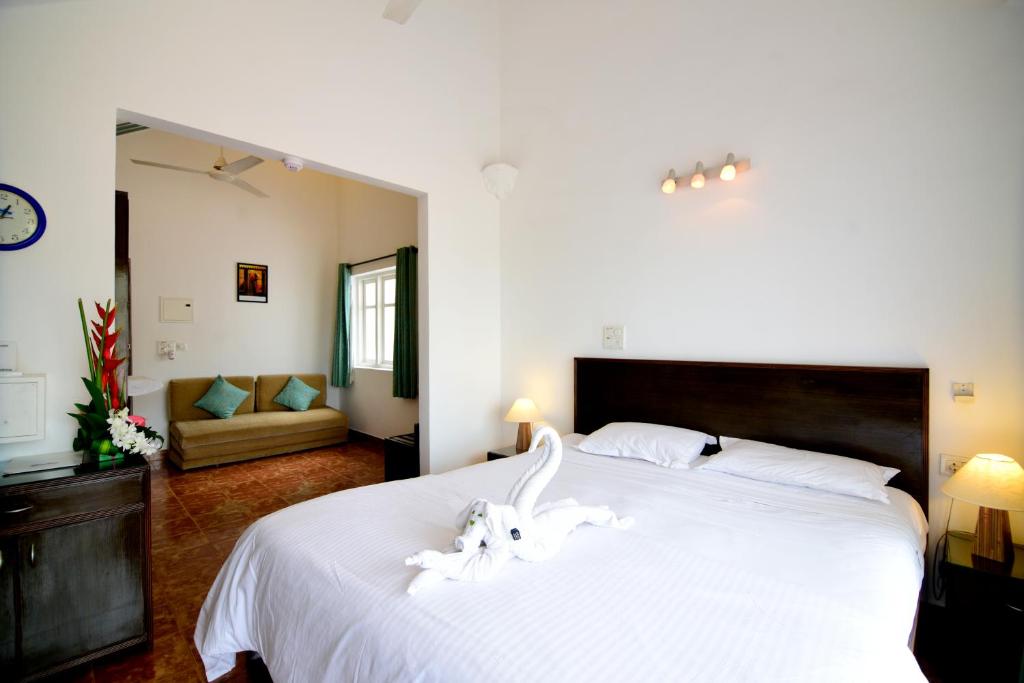 Postel nebo postele na pokoji v ubytování Santana Beach Resort