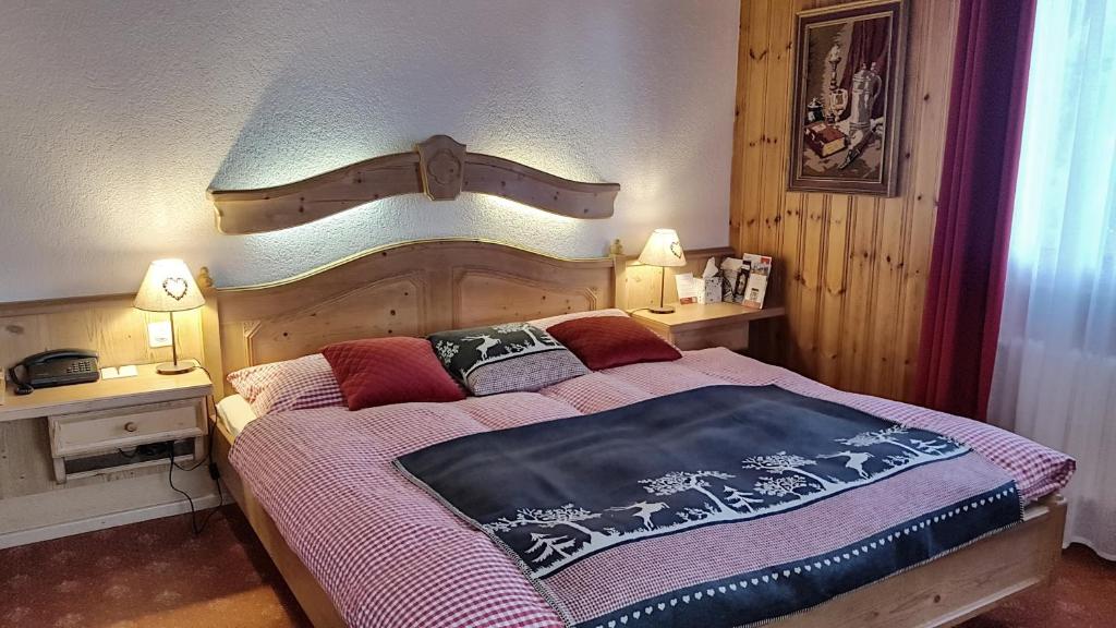 Postel nebo postele na pokoji v ubytování Hotel La Cambuse