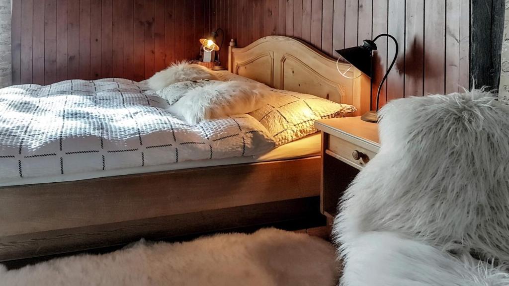 Postel nebo postele na pokoji v ubytování Hotel La Cambuse