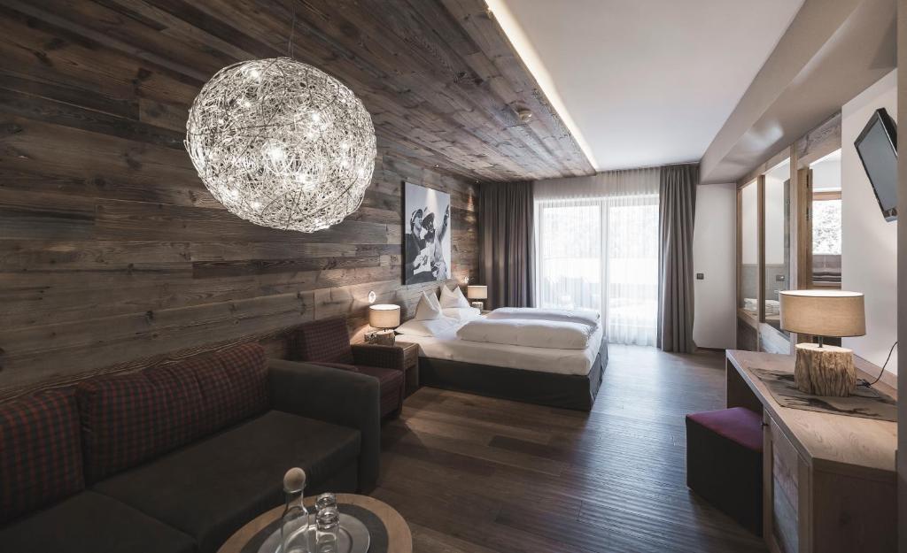 Postel nebo postele na pokoji v ubytování Hotel Alpenblick