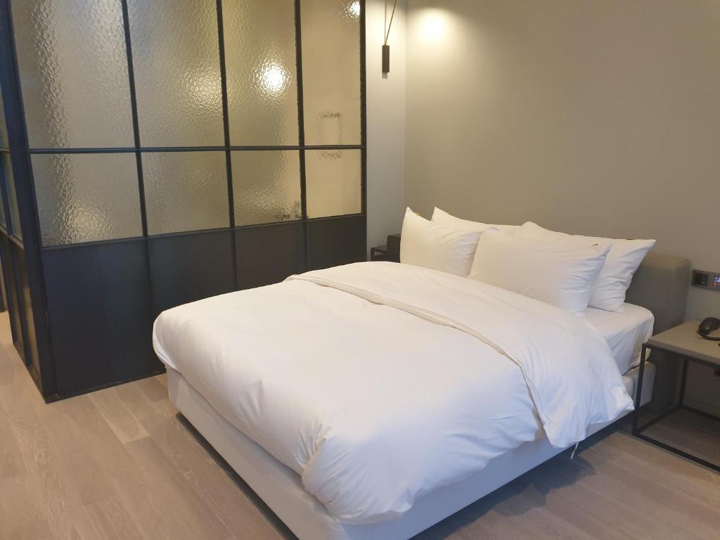 Postel nebo postele na pokoji v ubytování Hotel Libre