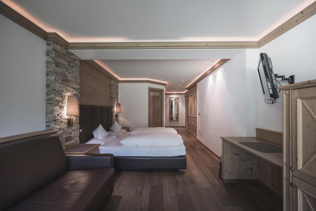 Postel nebo postele na pokoji v ubytování Hotel Alpenblick