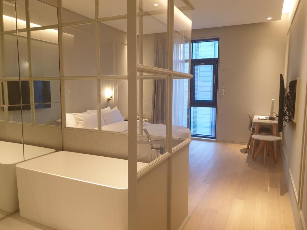 Postel nebo postele na pokoji v ubytování Hotel Libre