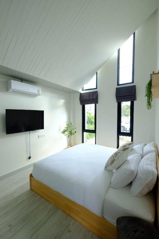 Letto o letti in una camera di Baan Ga-Cha
