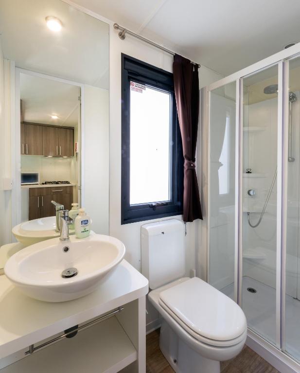 Een badkamer bij Fornella Camping & Wellness family resort