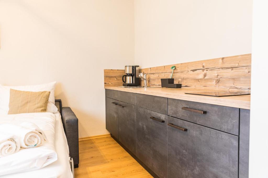 Kuchyň nebo kuchyňský kout v ubytování Chiemseer Wirtshaus