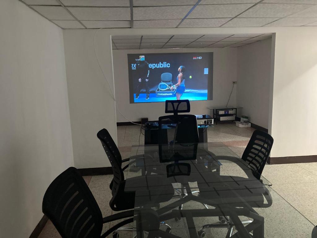 TV a/nebo společenská místnost v ubytování Moocoworking