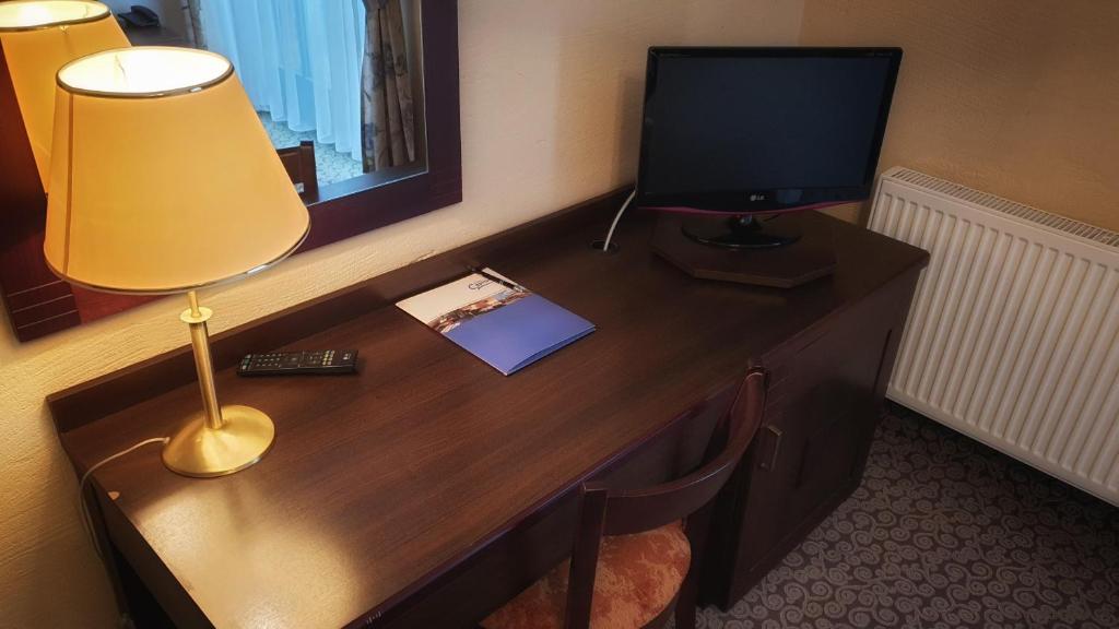 TV a/nebo společenská místnost v ubytování Hotel Cyprus