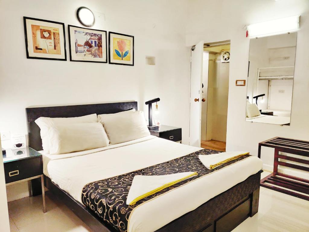 Postel nebo postele na pokoji v ubytování Bedrock Boutique Hostel