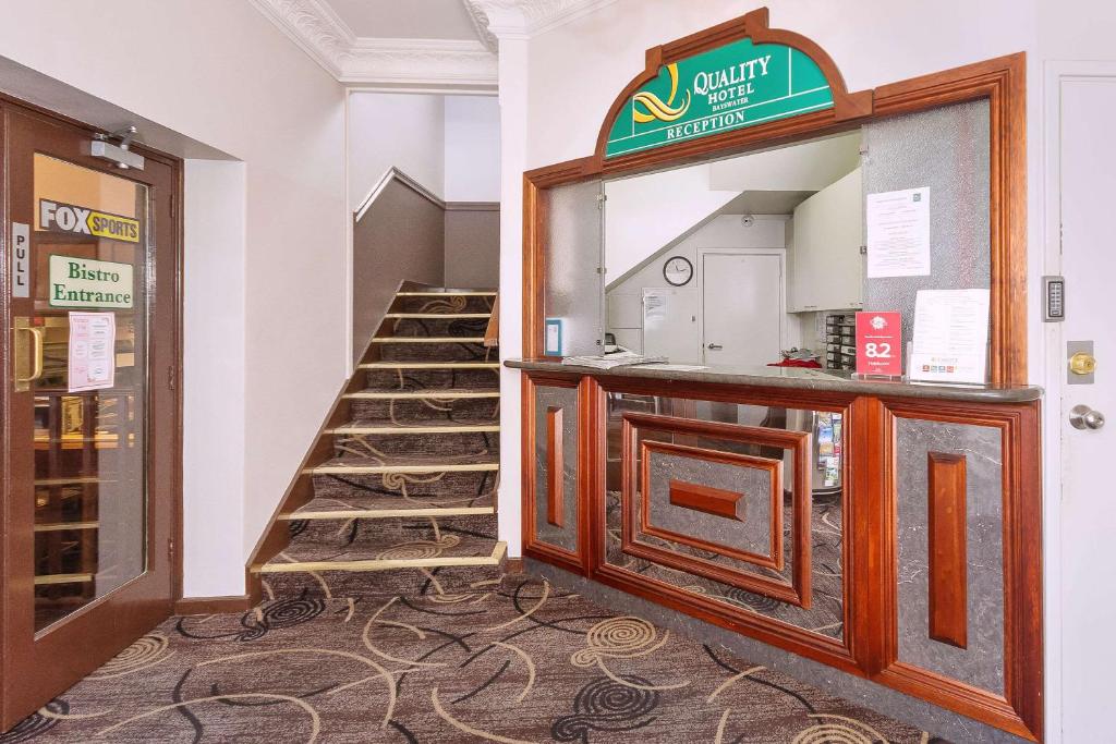 a room with a staircase leading to a stairwell at Quality Hotel Bayswater in Perth