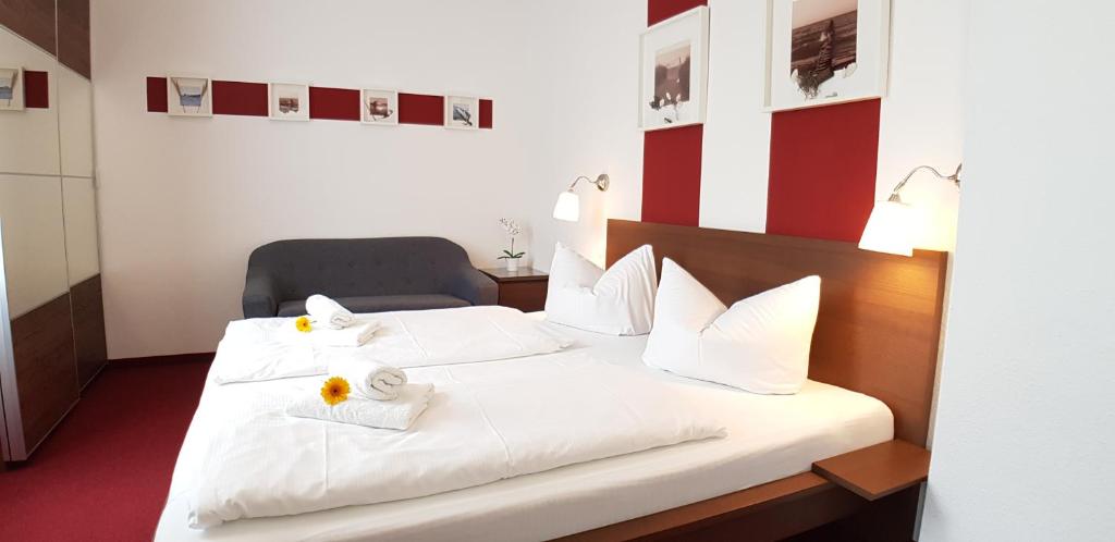 Postel nebo postele na pokoji v ubytování Pension Haus Waldesblick