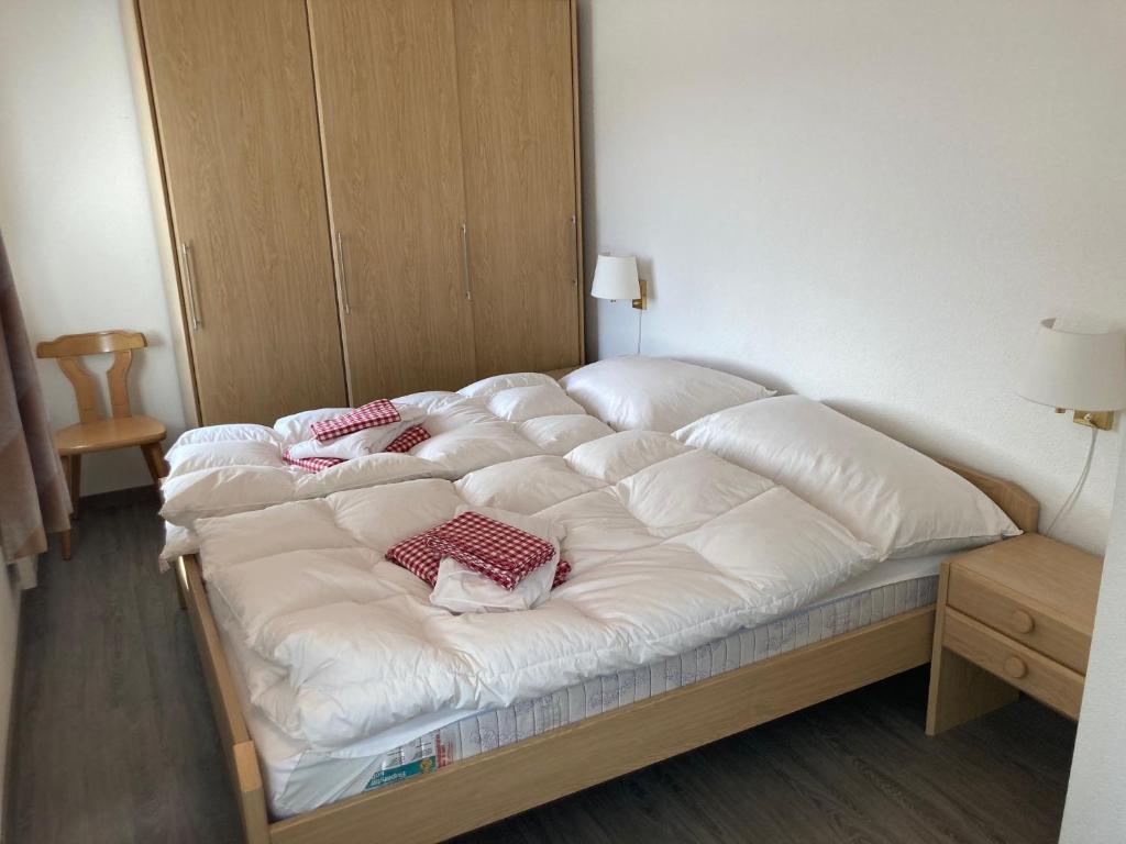 Postel nebo postele na pokoji v ubytování Chalet Bergli