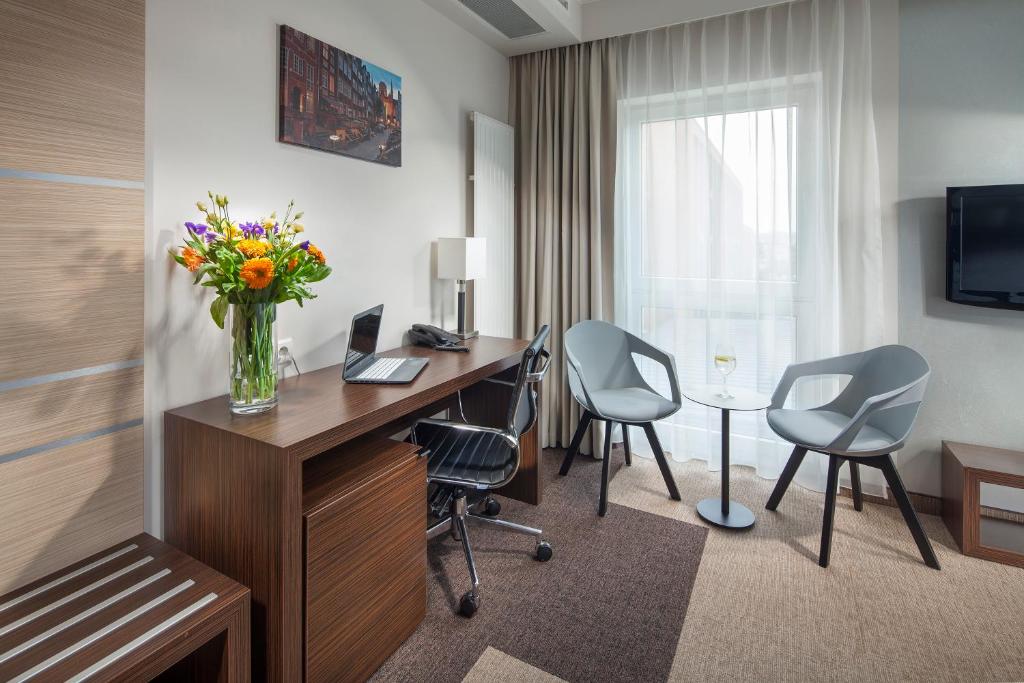 TV a/nebo společenská místnost v ubytování Hotel Arkon Park Gdańsk- Destigo Hotels
