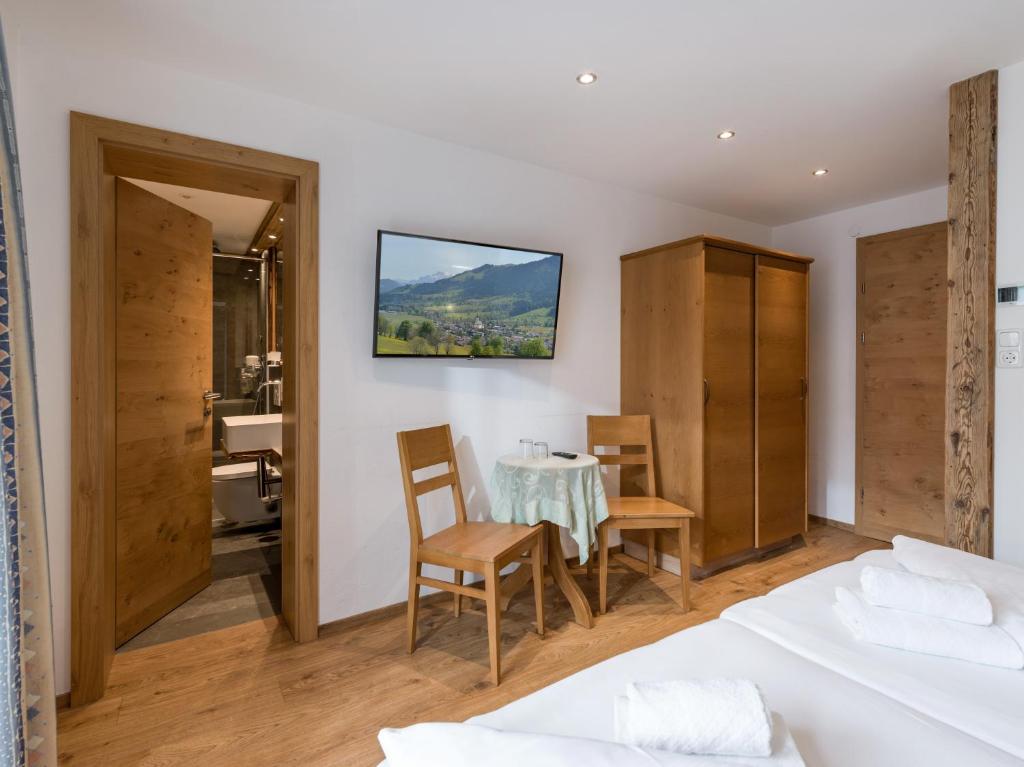 Posteľ alebo postele v izbe v ubytovaní Tennenwirt Guesthouse - Adults only