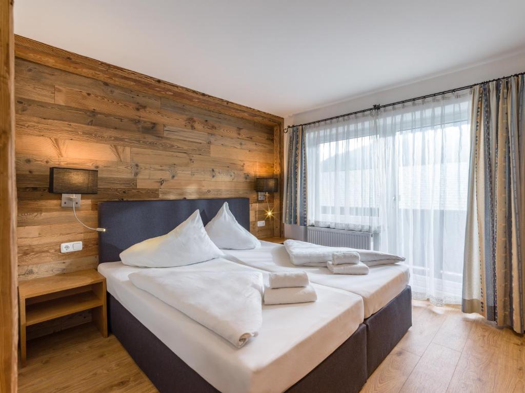 Posteľ alebo postele v izbe v ubytovaní Tennenwirt Guesthouse - Adults only