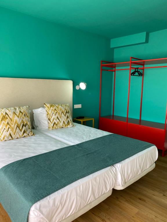 Postel nebo postele na pokoji v ubytování Hotel Ritual Maspalomas - Adults Only