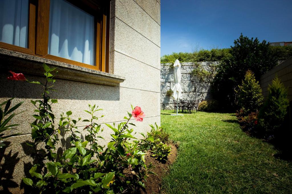 A garden outside Hotel Arce