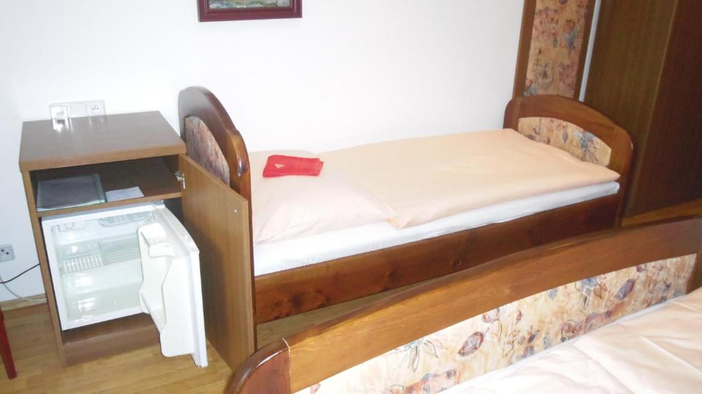 Postel nebo postele na pokoji v ubytování Pension Karolína