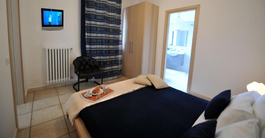 Postel nebo postele na pokoji v ubytování B&B A Casa Di Joy